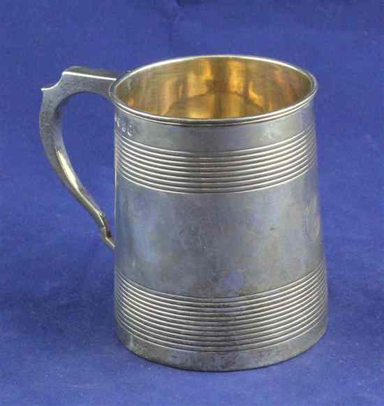 Appraisal: A George III silver christening mug of restrained tapering form