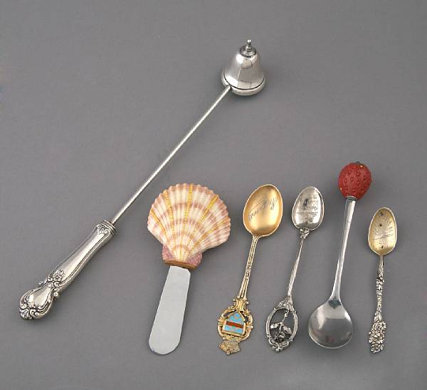 Appraisal: A group of George III silver sugar tongs souvenir spoons