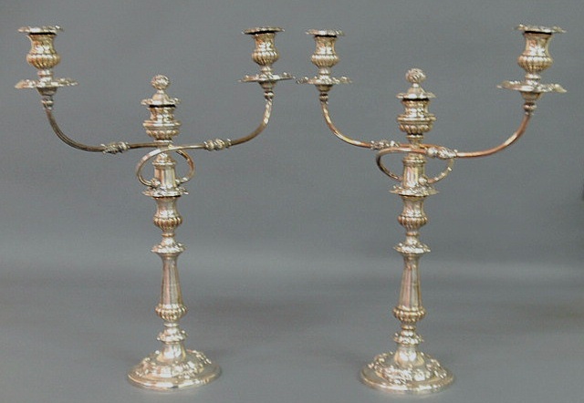 Appraisal: Pair of Sheffield silverplate candelabra th c h x w