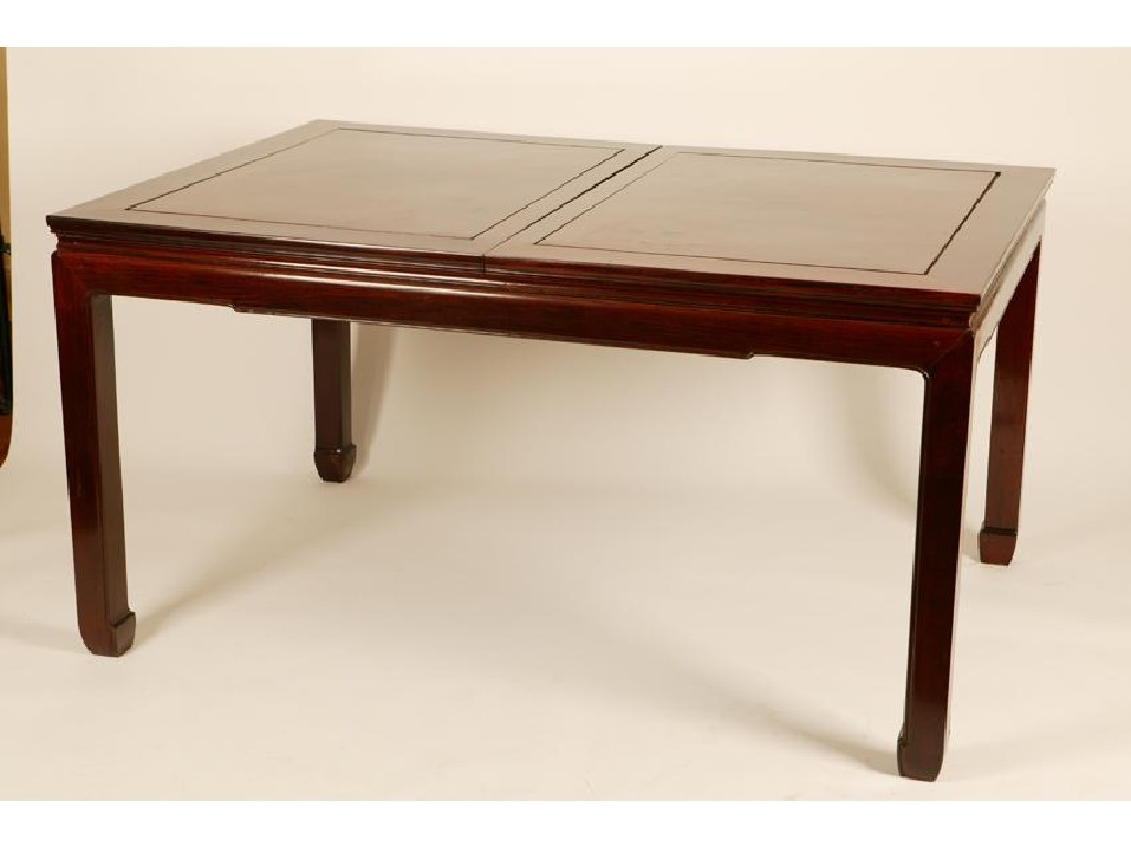 Appraisal: A CHINESE HARDWOOD EXTENDING DINING TABLE the top composed of