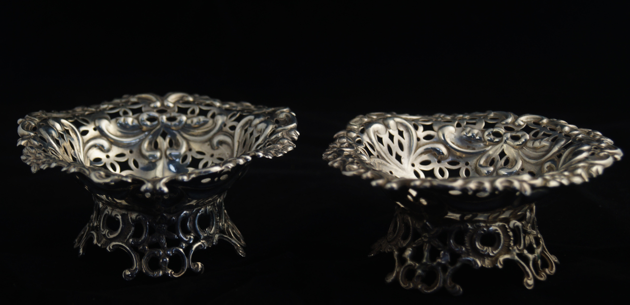 Appraisal: A pair of Victorian silver heart shaped footed sweetmeat dishes