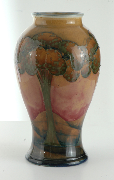 Appraisal: A MOORCROFT EVENTIDE PATTERN VASE Circa Baluster with a continuous