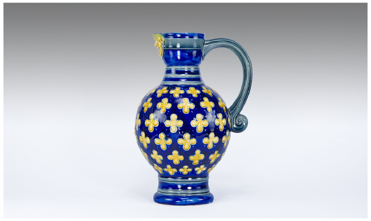 Appraisal: Minton Mask Spout Jug Royal Blue Ground with Raised Yellow