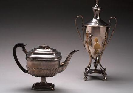 Appraisal: REGENCY SHEFFIELD PLATE COFFEE URN - Set on four incurved