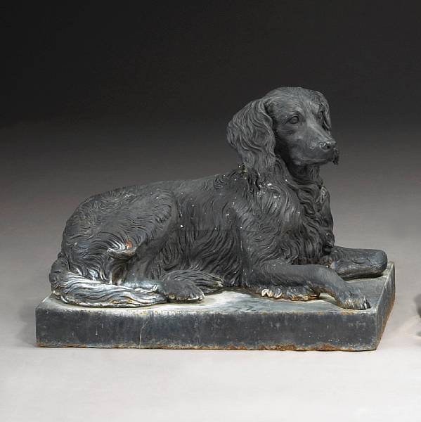 Appraisal: A French cast iron figure of a long hair retriever