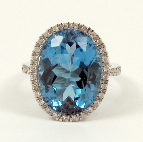 Appraisal: BLUE TOPAZ DIAMOND AND WHITE GOLD RING The k white