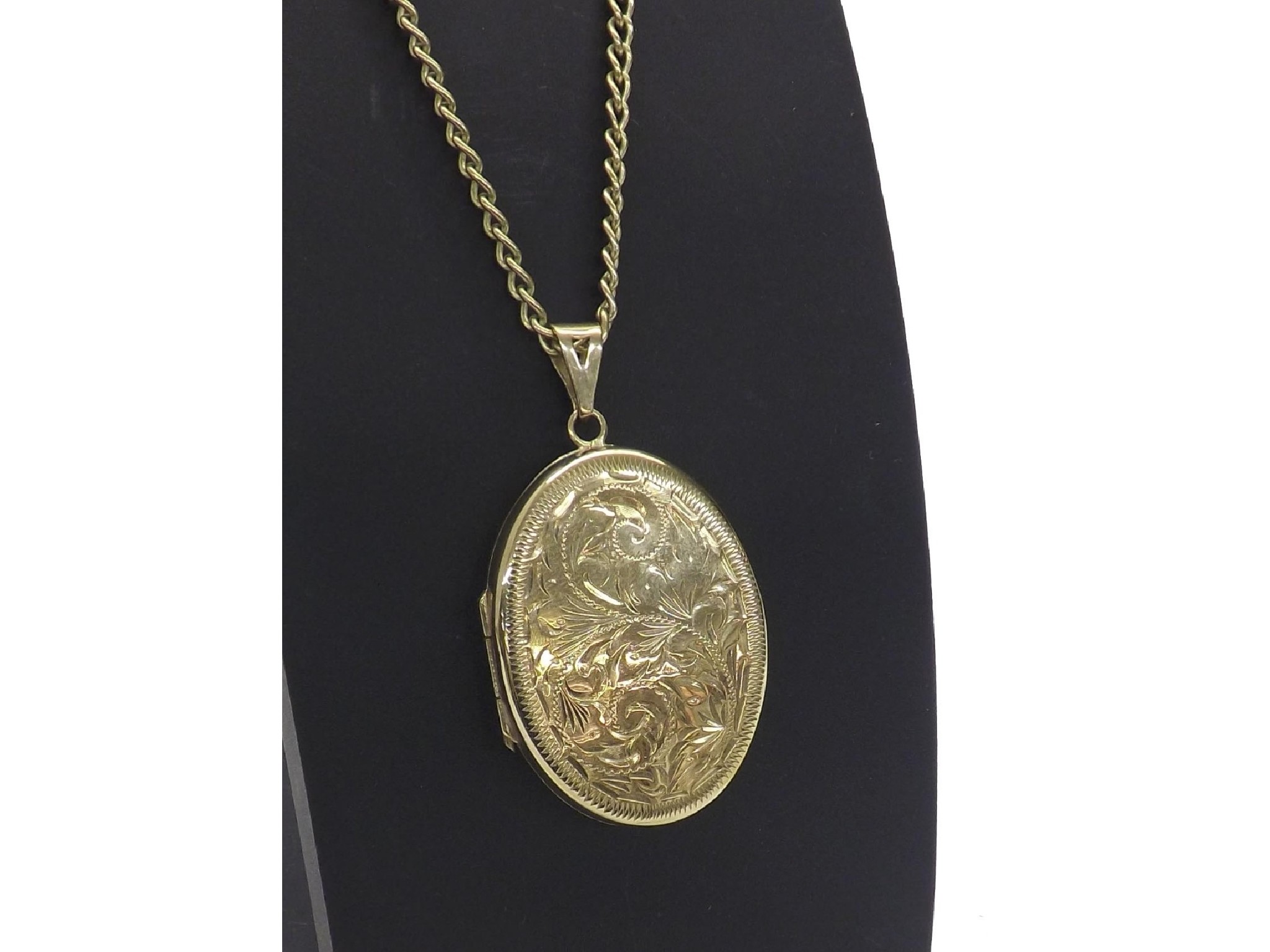 Appraisal: ct oval engraved locket on necklet gm the locket mm