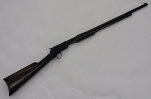 Appraisal: WINCHESTER MODEL SLIDE ACTION RIFLE long caliber octagonal barrel overall