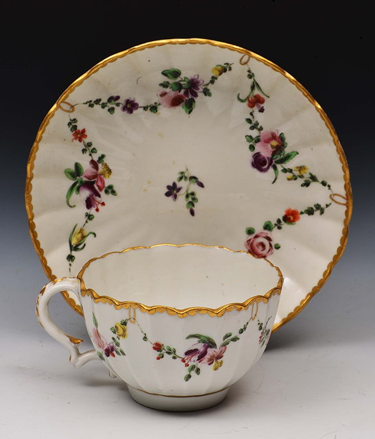 Appraisal: Bristol porcelain cup and saucercirca both with fluted designs decorated