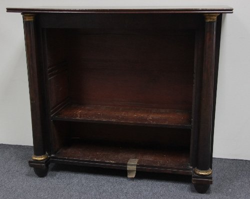 Appraisal: A Empire mahogany open bookcase the plain rectangular top with