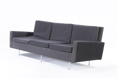 Appraisal: FLORENCE KNOLL KNOLL Three-seat sofa upholstered in dark grey fabric