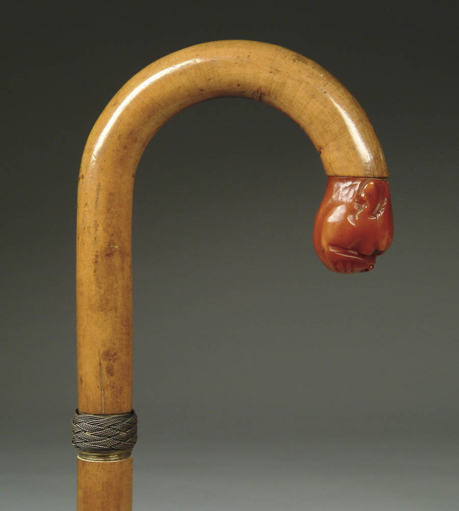 Appraisal: INTERESTING DOG LIGHT CANE Crook handle wood cane has a