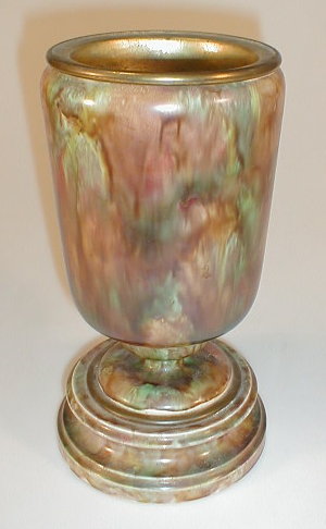 Appraisal: A thC stoneware oil lamp base of urn shape decorated