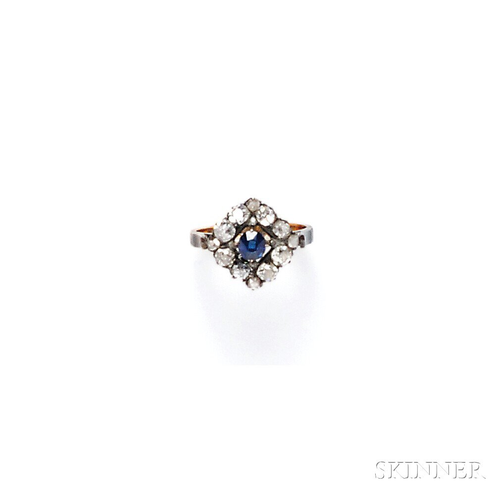 Appraisal: Sapphire and Diamond Ring set with a cushion-cut sapphire framed