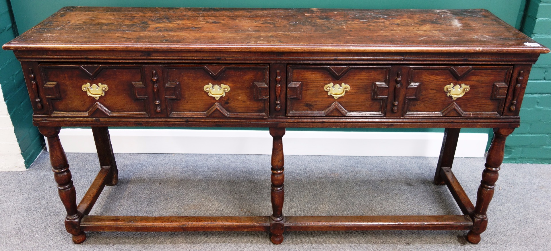 Appraisal: A th century oak dresser with pair of geometric moulded