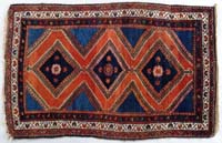 Appraisal: SHIRAZ ORIENTAL SCATTER RUG Mid th century The colorful rug