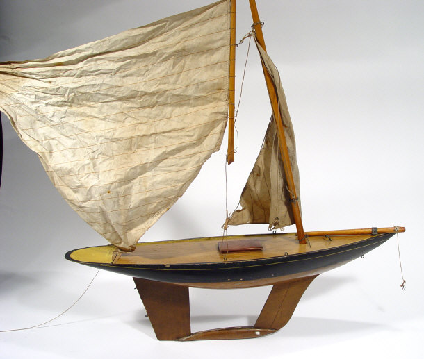 Appraisal: Child's wooden pond yacht with painted hull masts and rigging