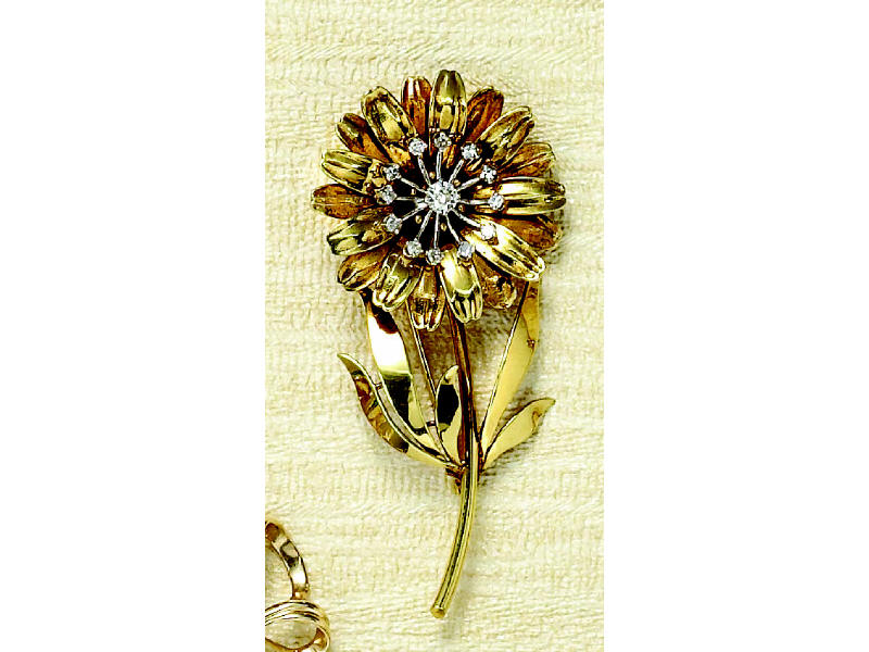 Appraisal: DIAMOND SUNFLOWER BROOCH k yellow gold flower with stem with