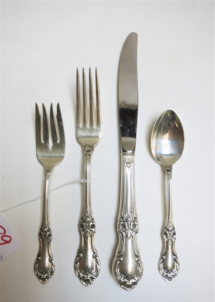 Appraisal: INTERNATIONAL WILD ROSE STERLING SILVER FLATWARE SET plus storage chest