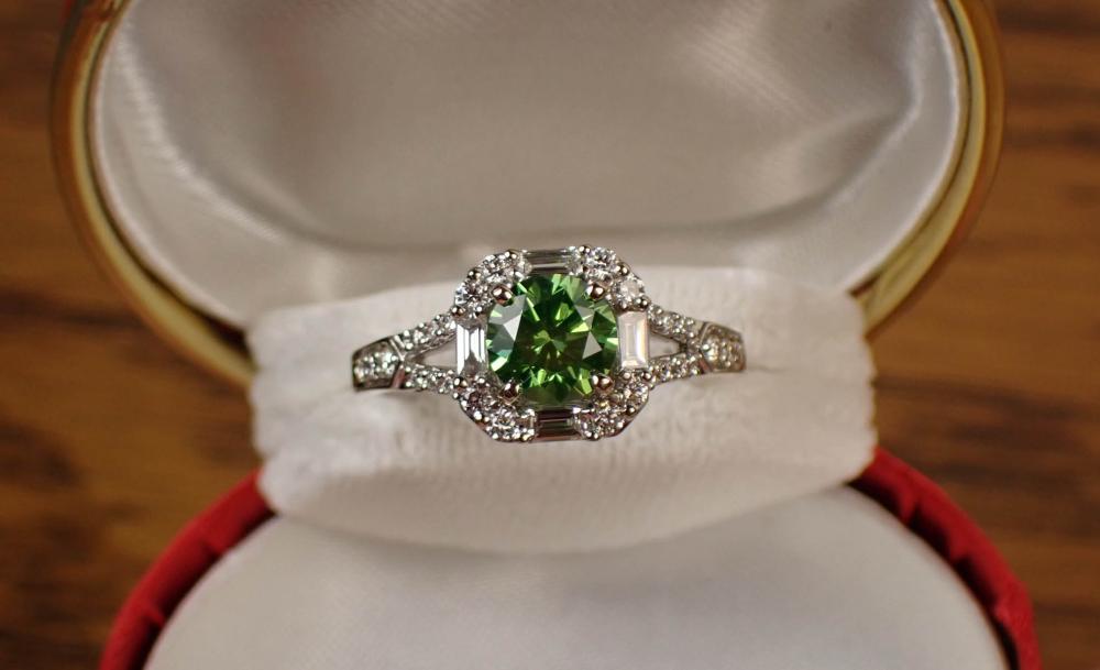 Appraisal: GREEN DIAMOND WHITE DIAMONDS AND FOURTEEN KARAT WHITE GOLD RING