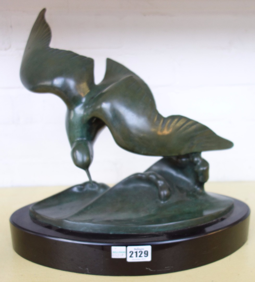 Appraisal: A green patinated bronze by J B Leonard late th