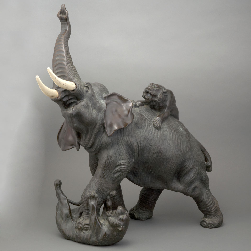 Appraisal: Japanese Bronze and Painted Wood Group of an Elephant and