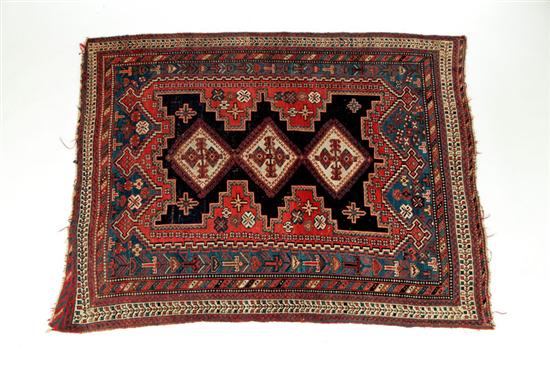 Appraisal: ORIENTAL RUG Early th century Caucasian Geometric with multiple Kuba-