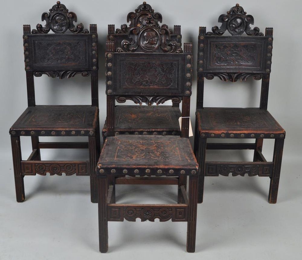 Appraisal: Set Four Renaissance Revival Carved Side Chairs with embossed leather