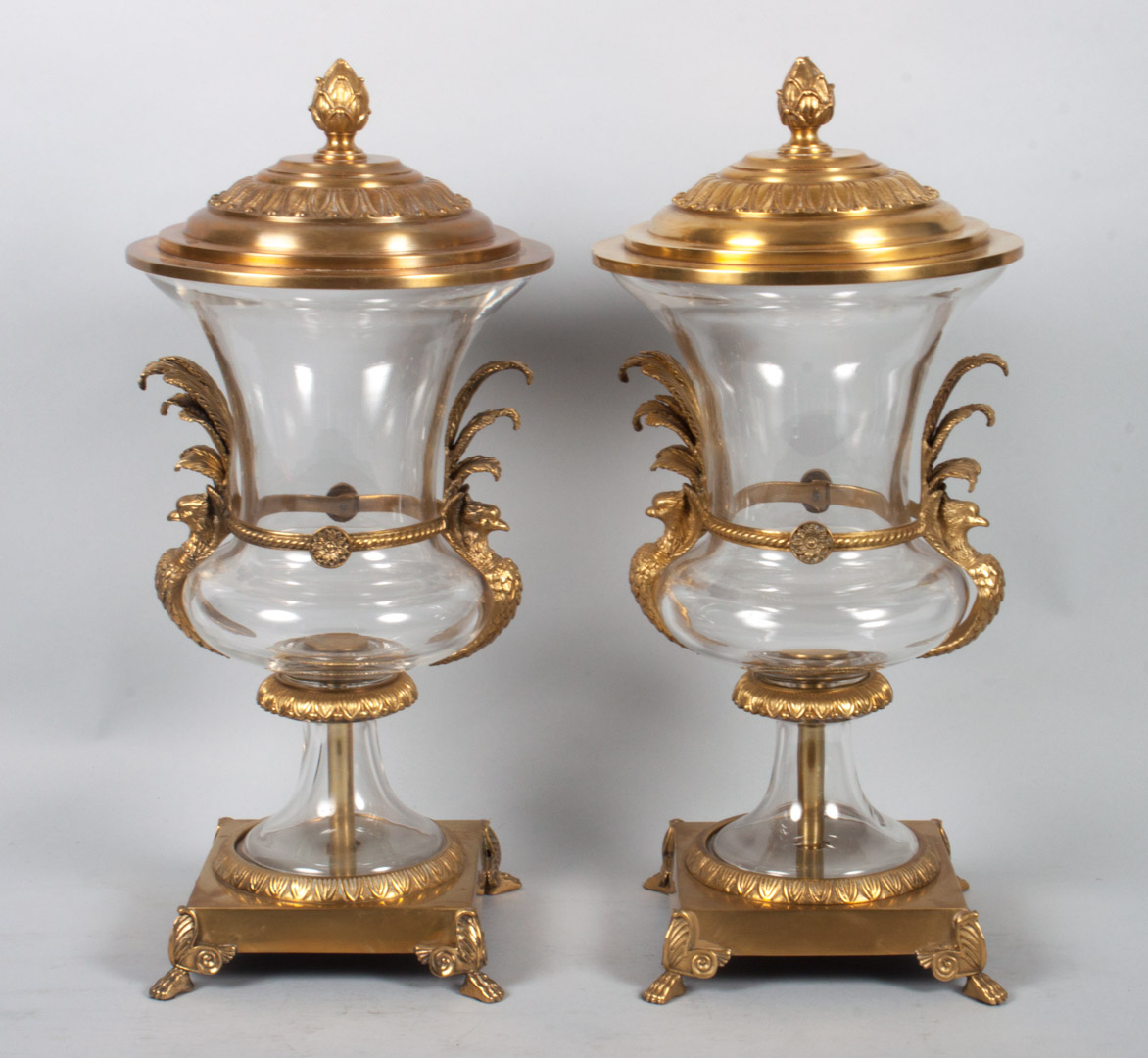 Appraisal: Pair of Louis XVI style bronze-mounted urns Classical style colorless