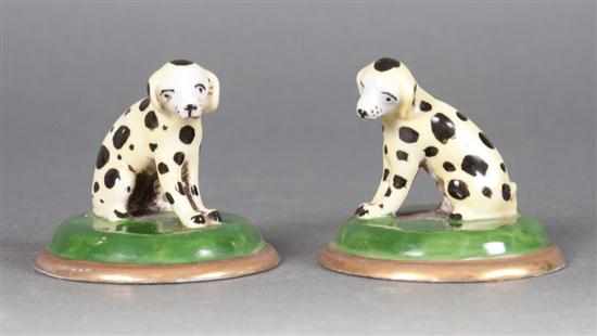 Appraisal: Pair of Staffordshire style painted earthenware Dalmatians th century pseudo