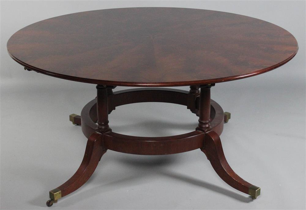 Appraisal: REGENCY STYLE BANDED AND INLAID FLAME MAHOGANY CIRCULAR EXTENSION DINING