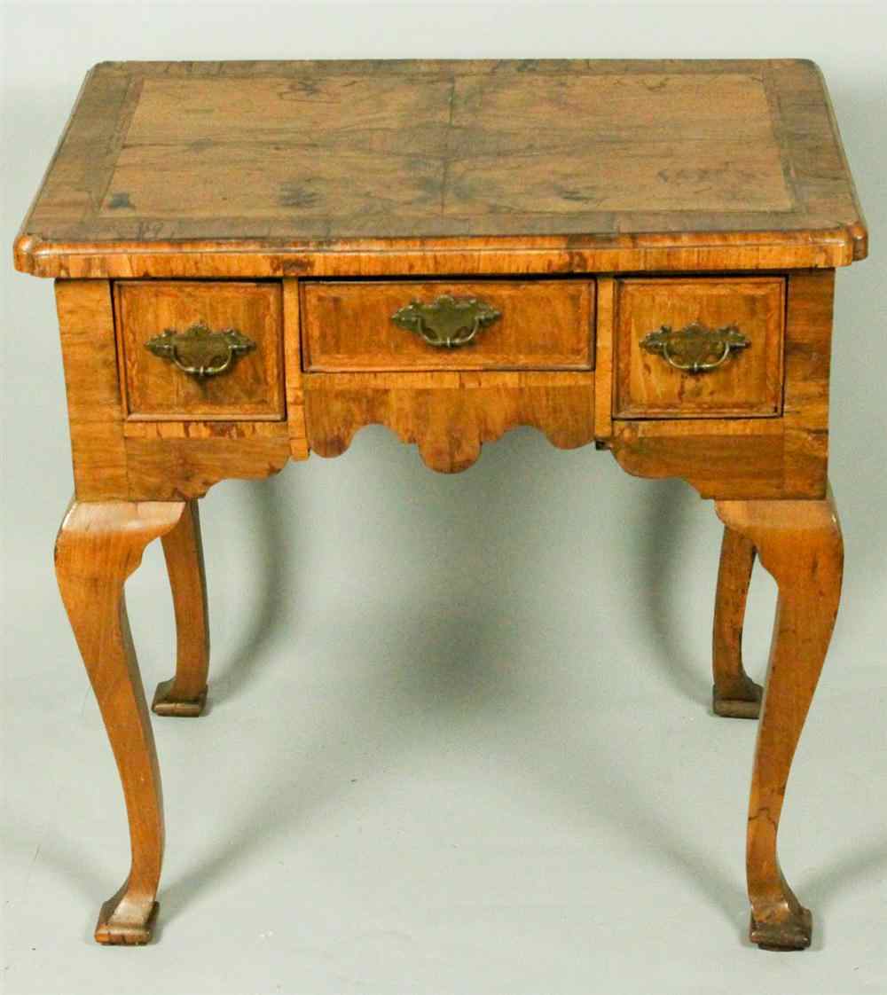 Appraisal: GEORGE II ELMWOOD LOWBOY having a rectangular top with diamond