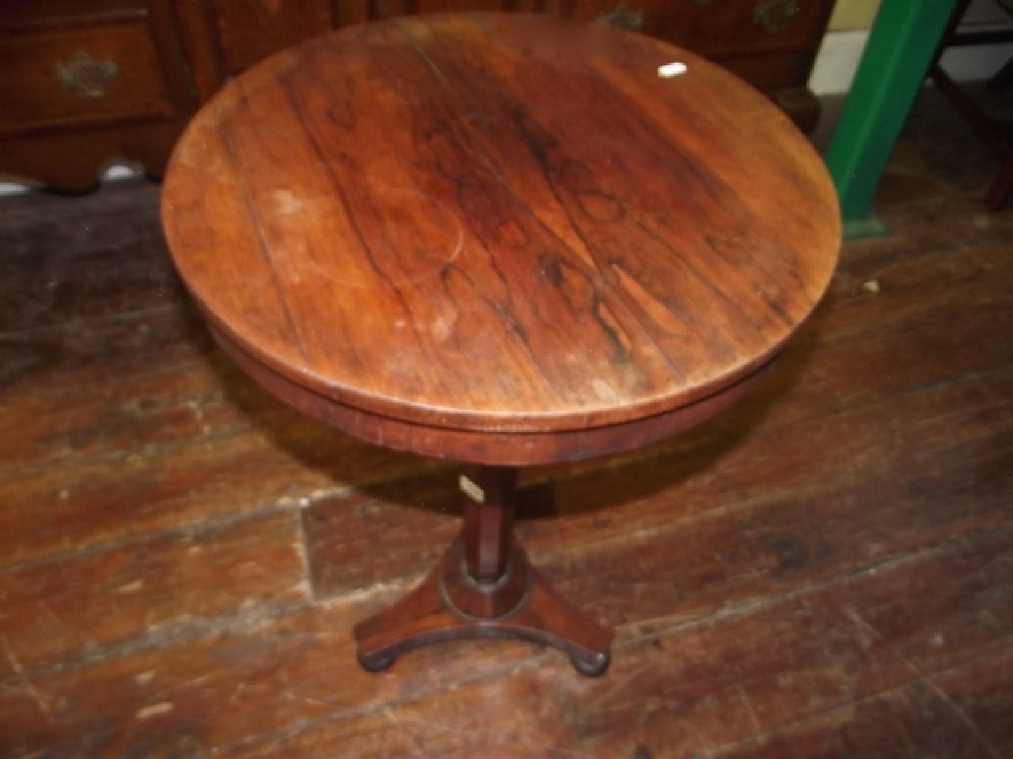 Appraisal: A th century rosewood occasional table the circular top raised