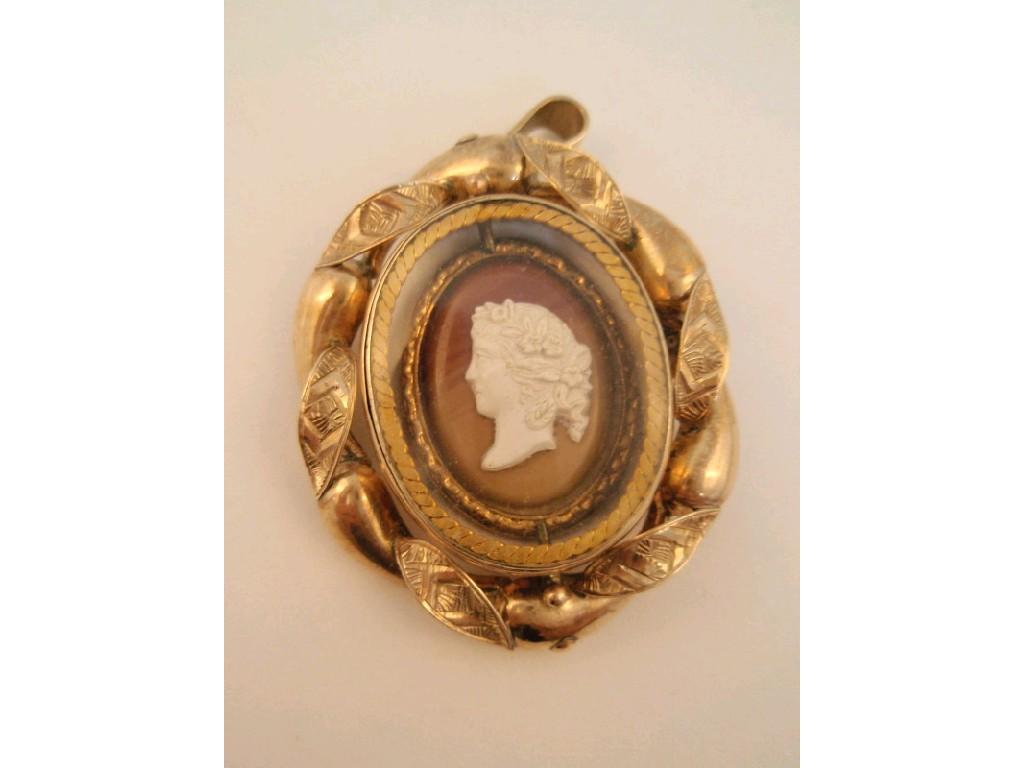 Appraisal: A Victorian memorial pendant cameo to front hair insert to