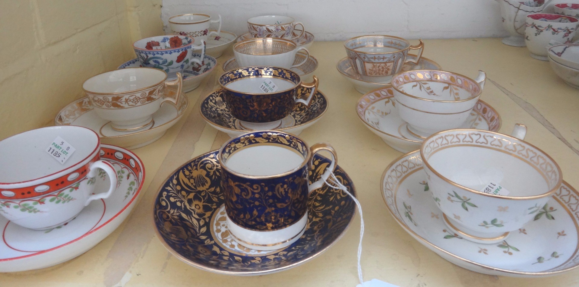 Appraisal: A group of eleven English porcelain cups and saucers early