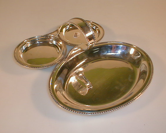 Appraisal: A George V silver trefoil dish with loop handle stamped