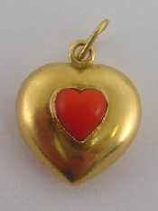 Appraisal: A yellow metal tests carat gold heart pendant approx cm