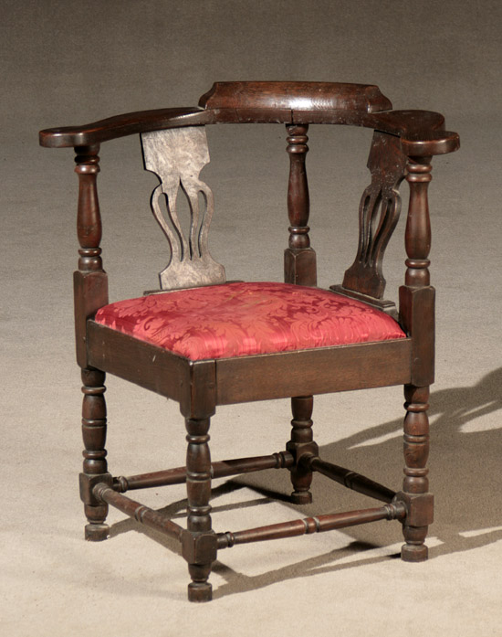 Appraisal: George III Oak Corner Armchair Circa Having a wine-red floral