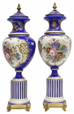 Appraisal: pair Sevres style porcelain bolted urns th c royal blue