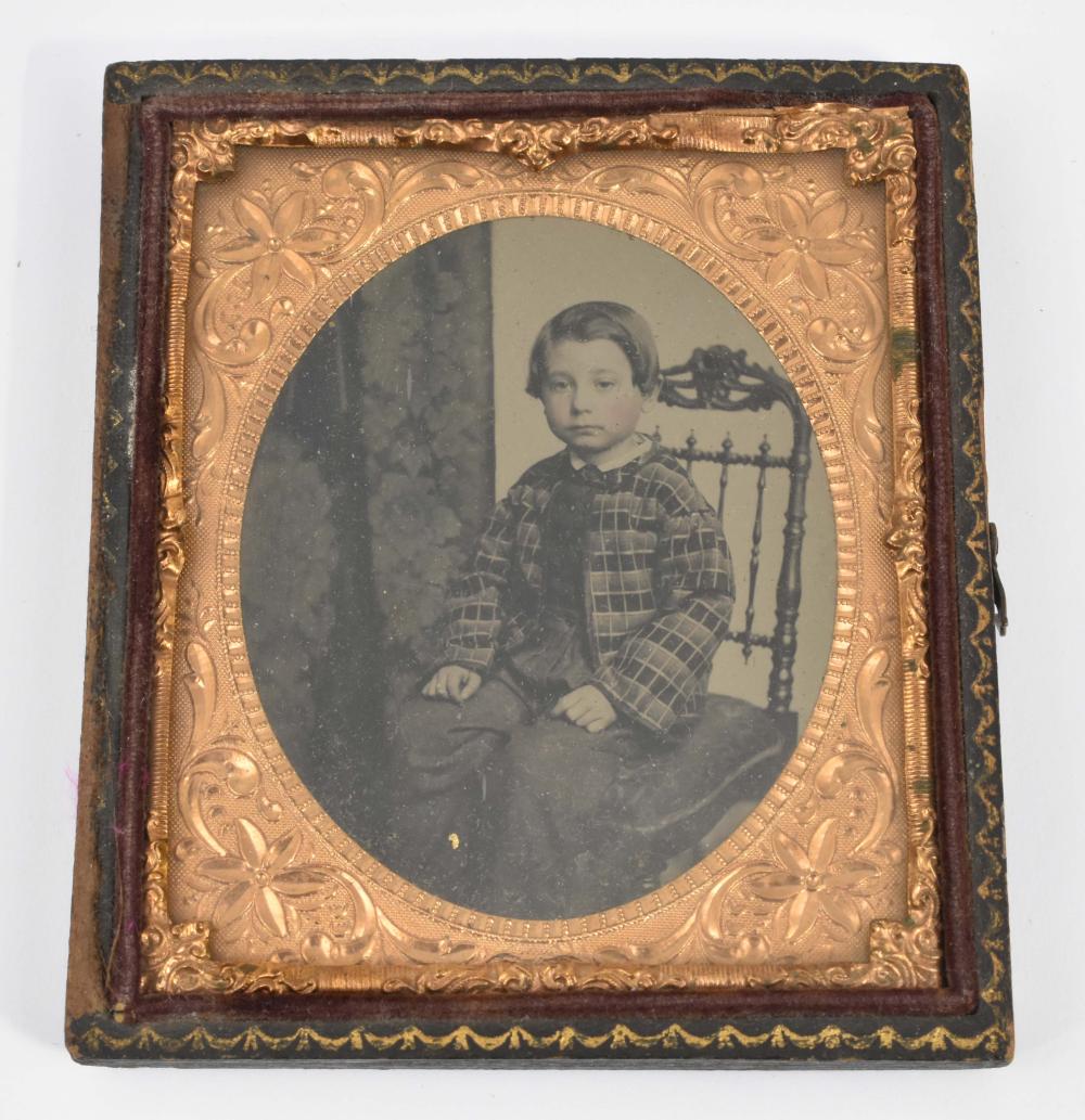 Appraisal: AMBROTYPE OF A BOY SEATED ON A CHAIRAMBROTYPE OF A