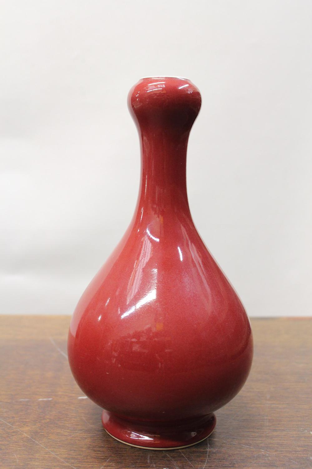 Appraisal: TWO CHINESE PORCELAIN RED GLAZED VESSELS comprised of the garlic