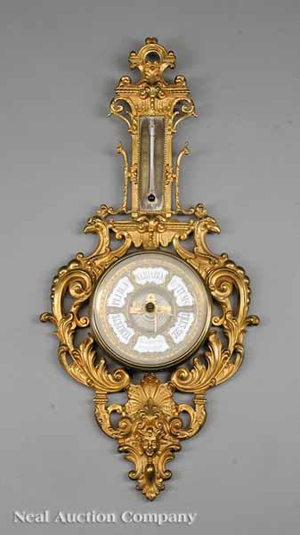 Appraisal: An Antique French Gilt Bronze Aneroid Barometer upper portion incorporating