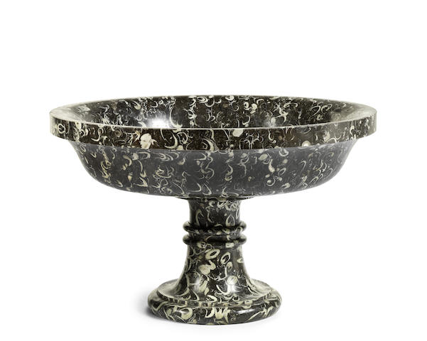 Appraisal: An Italian black lumachella marble urn with a simple moulded