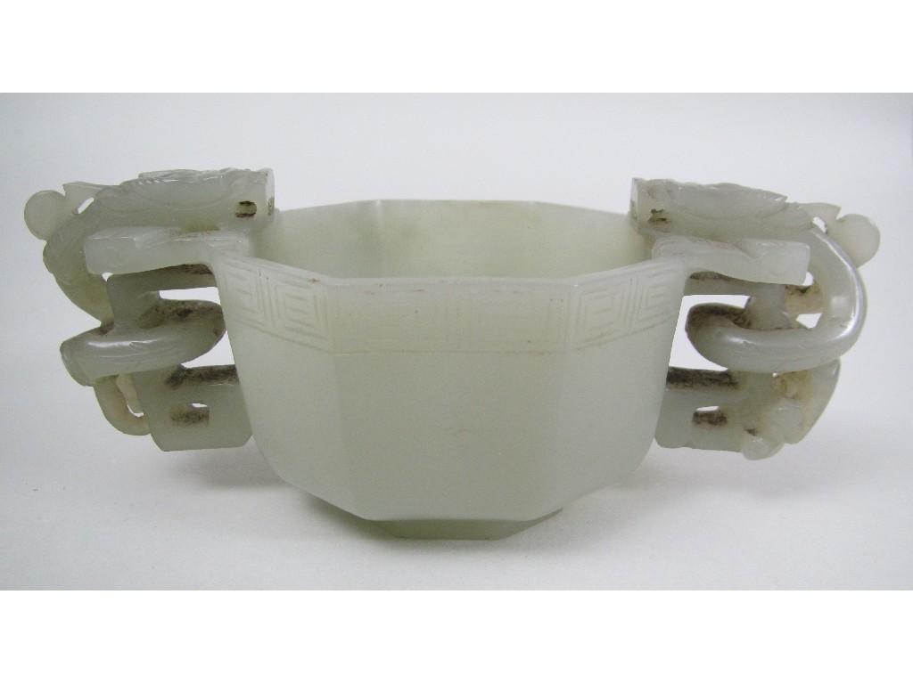 Appraisal: A Chinese celadon jade octagonal libation cup the outer rim