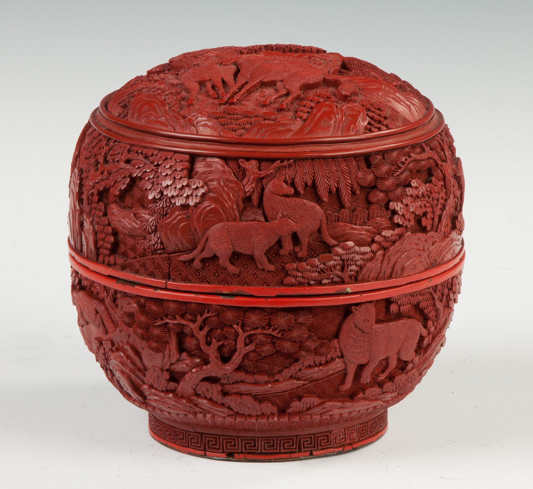 Appraisal: Carved Cinnabar Lacquer Covered Box With animals and landscape