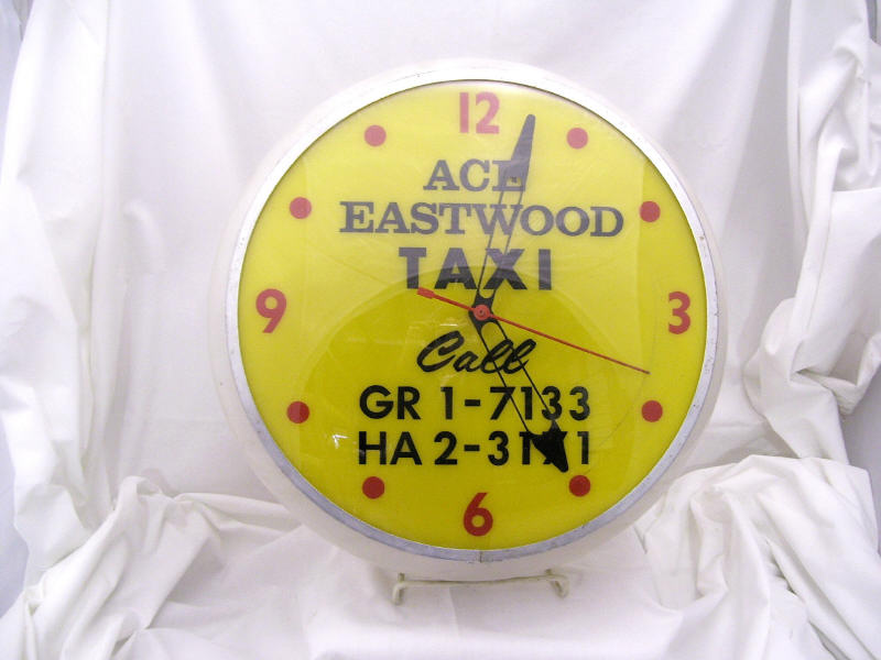 Appraisal: Ace Eastwood Taxi Bubble Face Clock Plastic edge with flat