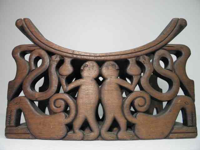 Appraisal: Indonesian South Seas carved wood figural camel bench or stool