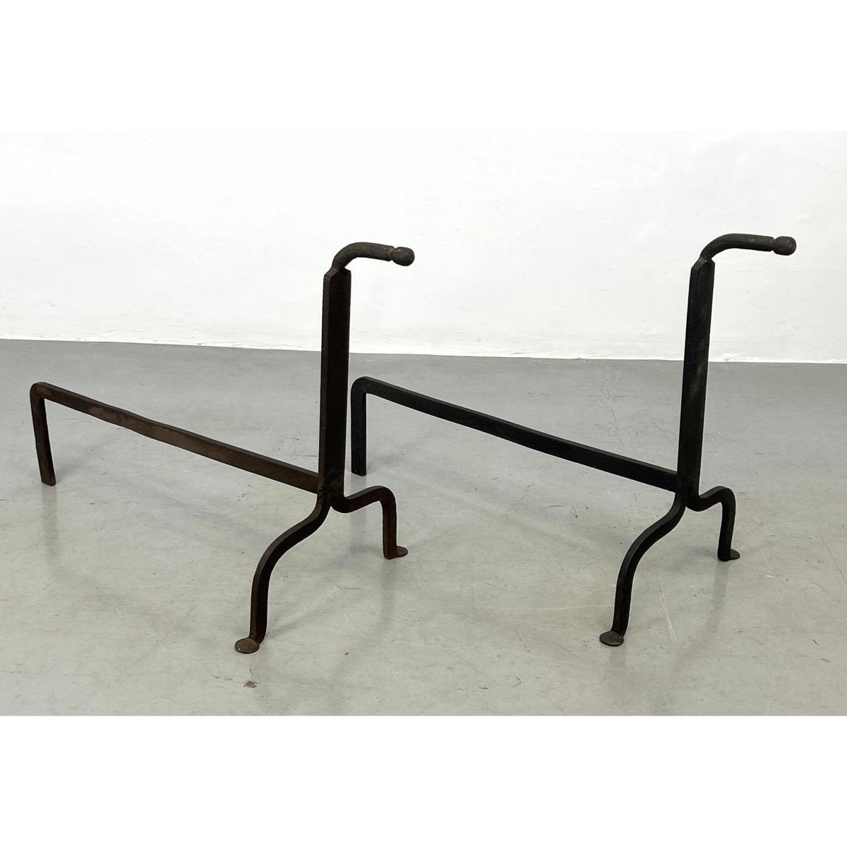 Appraisal: Modernist Minimalist Iron Andirons Dimensions H inches W inches D