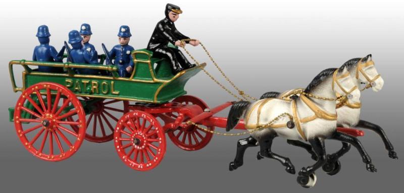 Appraisal: Cast Iron Reproduction Police Patrol Wagon Toy Description Includes five