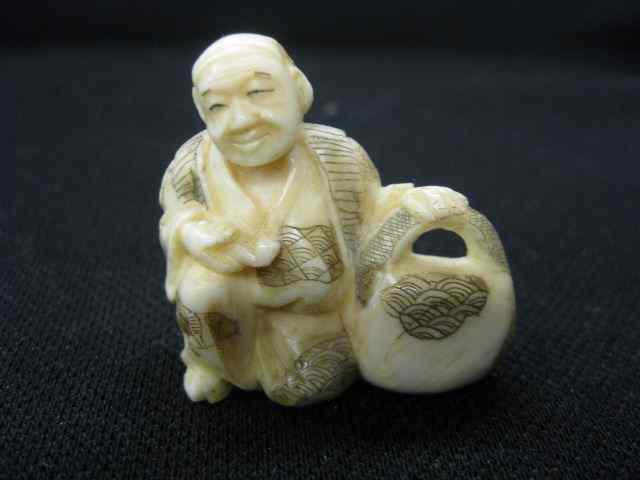 Appraisal: Chinese Carved Ivory Netsuke man with basket signed '' excellent